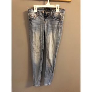 Light wash skinny jeans.